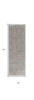 7' X 10' Silver Taupe and Blue Oriental Power Loom Worn Faded Area Rug With Fringe
